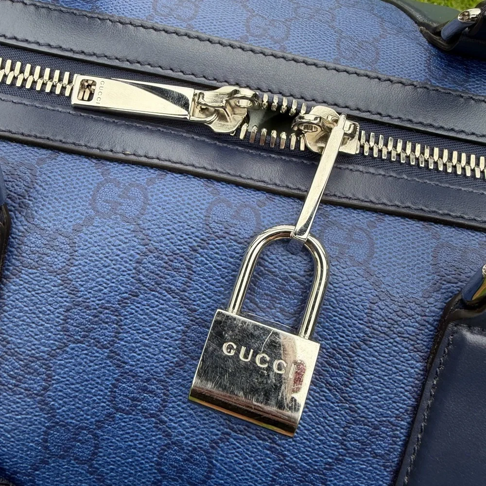 GUCCI Supreme Chroma large duffle bag